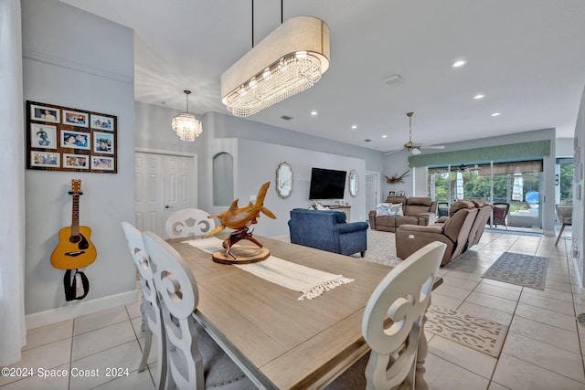 dining space with visible vents, baseboards, recessed lighting, ceiling fan with notable chandelier, and light tile patterned flooring