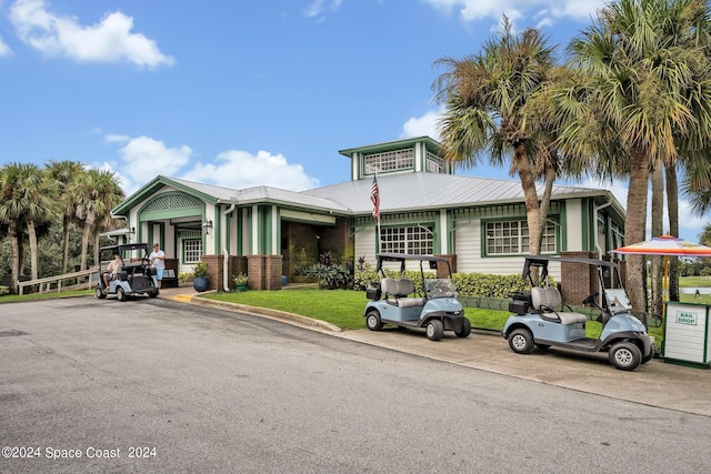 view of front of property featuring metal roof