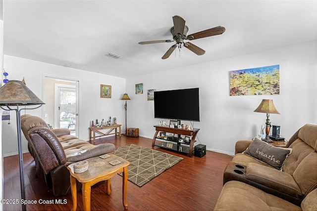 489 Seacrest Ave, Merritt Island, FL 32952 - living room with ceiling fan, visible vents, baseboards, and wood finished floors