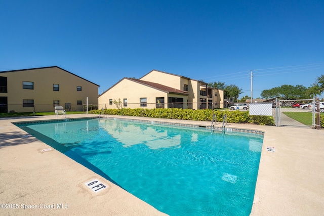 pool featuring fence