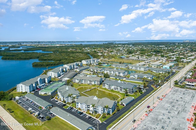 bird's eye view with a water view