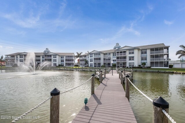 dock area featuring a water view