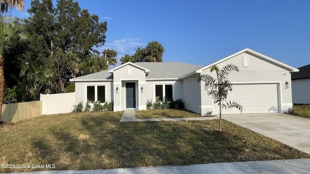 ranch-style home featuring a front lawn, fence, concrete driveway, stucco siding, and a garage