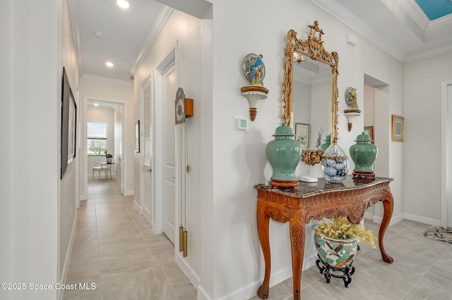 hall featuring light tile patterned floors, recessed lighting, baseboards, and ornamental molding