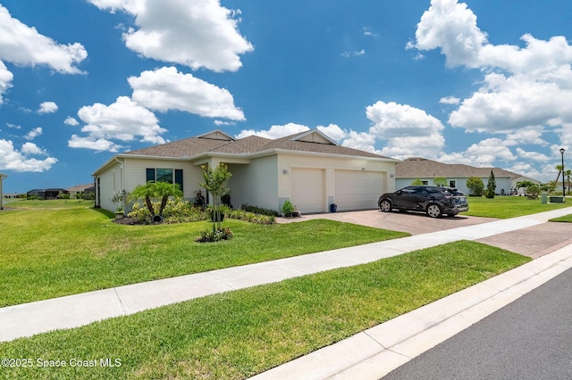 ranch-style house with a garage, decorative driveway, and a front lawn