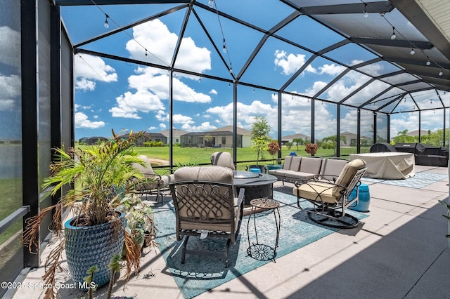 view of patio / terrace with a lanai and an outdoor living space