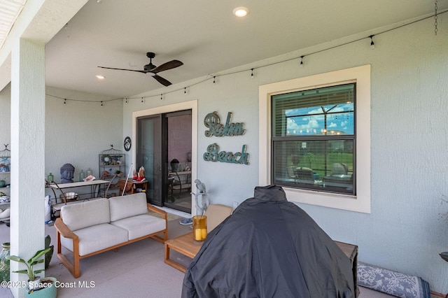 view of patio / terrace featuring a ceiling fan