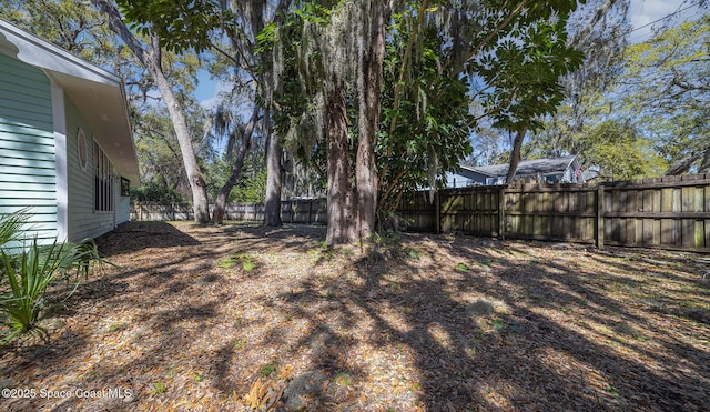 view of yard featuring a fenced backyard