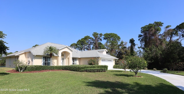 view of front of house featuring stucco siding, an attached garage, concrete driveway, and a front lawn