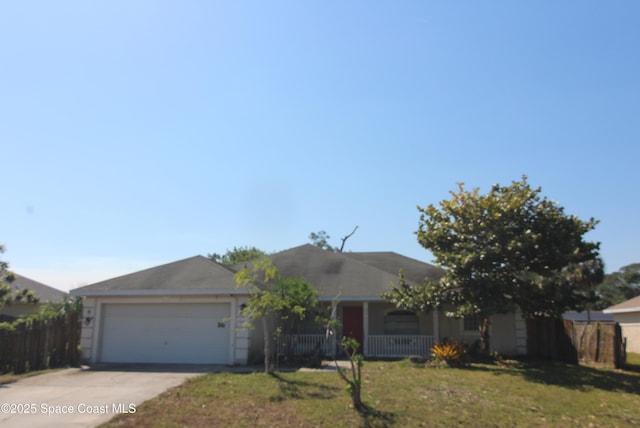 ranch-style house featuring a garage, a porch, driveway, and fence