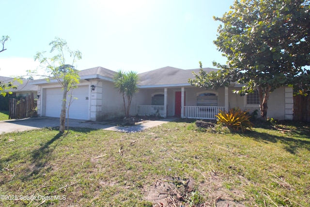 ranch-style house with a front yard, a porch, concrete driveway, and an attached garage