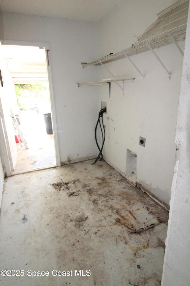 clothes washing area featuring laundry area, electric dryer hookup, and washer hookup