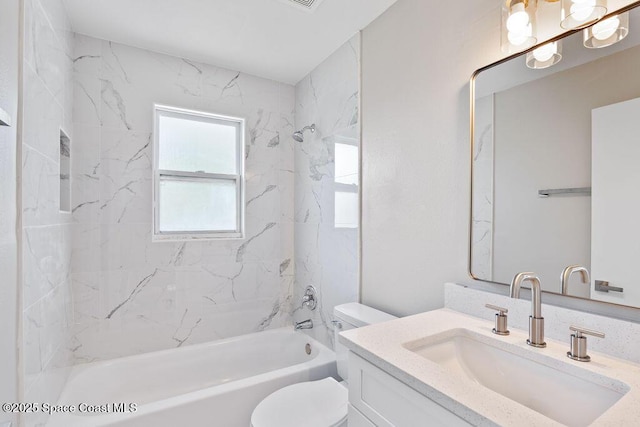 full bathroom featuring vanity, toilet, and washtub / shower combination