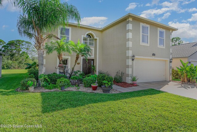 view of front of property with concrete driveway, a garage, a front yard, and stucco siding