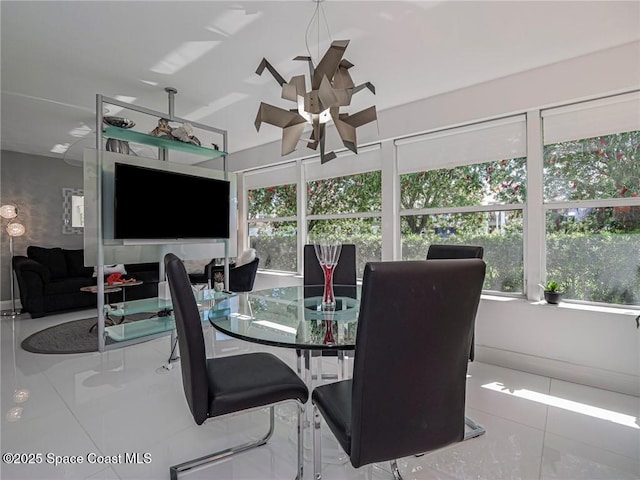 interior space with a wealth of natural light and ceiling fan