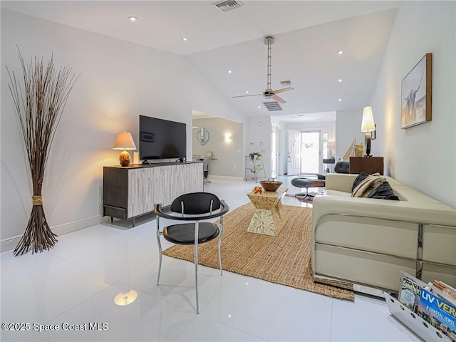 tiled living room featuring visible vents, recessed lighting, baseboards, and high vaulted ceiling