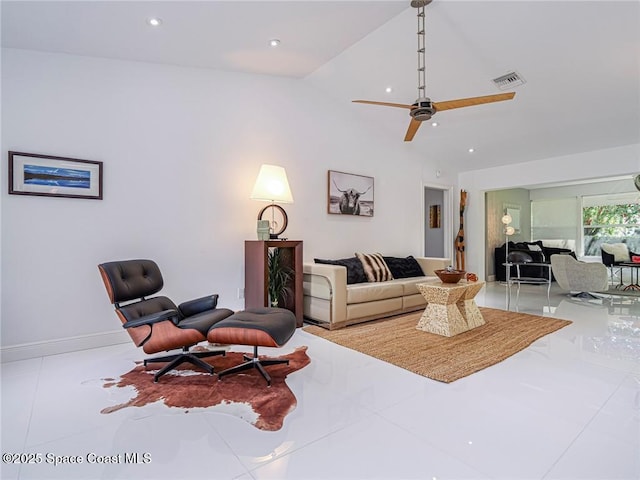 living area featuring tile patterned floors, visible vents, a ceiling fan, recessed lighting, and baseboards