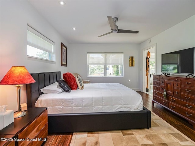 bedroom with multiple windows, recessed lighting, baseboards, and ceiling fan