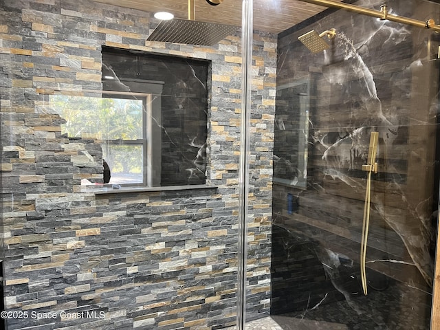 2275 Pineapple Pl, Merritt Island, FL 32952 - bathroom with a marble finish shower