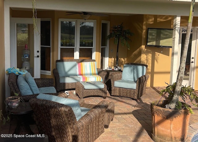 view of patio / terrace featuring an outdoor living space and a ceiling fan