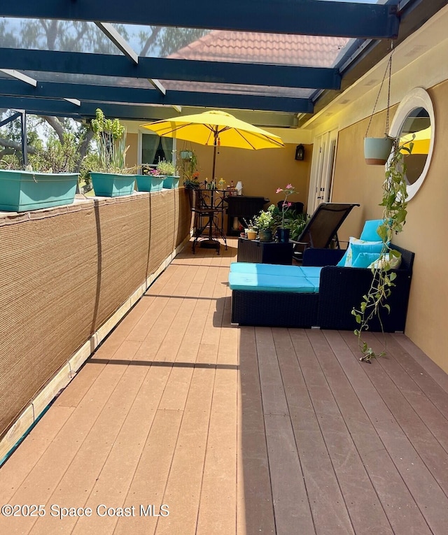 wooden terrace with a lanai