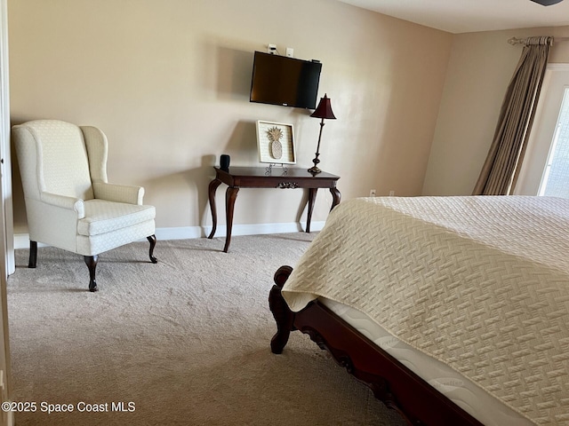 carpeted bedroom with baseboards