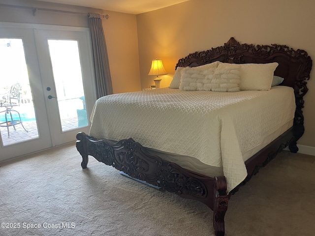 carpeted bedroom with access to outside and french doors