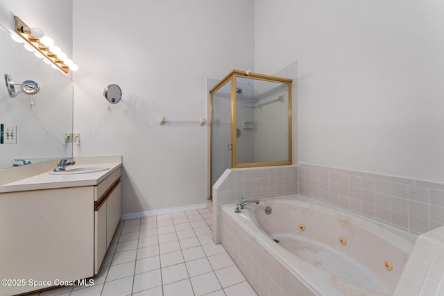 bathroom featuring vanity, baseboards, a whirlpool tub, tile patterned flooring, and a shower stall