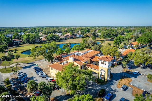 birds eye view of property featuring a residential view and a water view