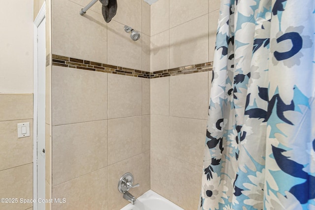 full bath featuring shower / bath combo with shower curtain