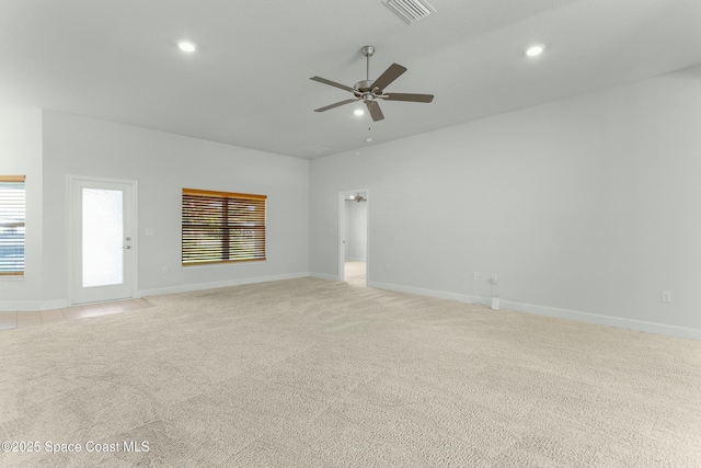 spare room featuring recessed lighting, light colored carpet, visible vents, and ceiling fan