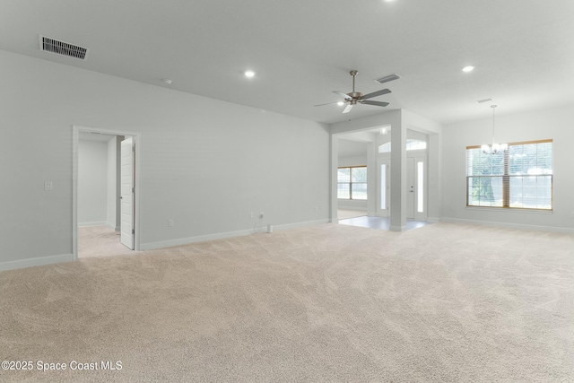 empty room with recessed lighting, visible vents, and light colored carpet