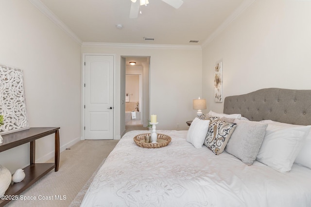 bedroom with light carpet, visible vents, and crown molding