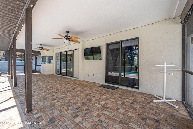 view of patio / terrace featuring a ceiling fan