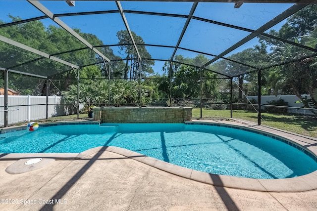 view of pool with a lanai, a fenced in pool, a patio, and a fenced backyard