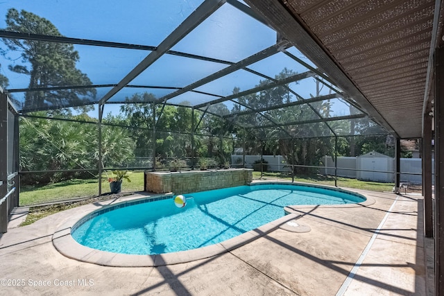 view of swimming pool featuring a fenced in pool, a storage shed, an outdoor structure, a fenced backyard, and a patio