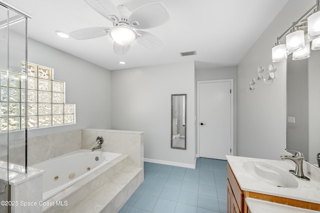 full bathroom with tile patterned floors, visible vents, a ceiling fan, a tub with jets, and vanity