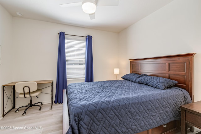 bedroom featuring a ceiling fan and light wood-style floors