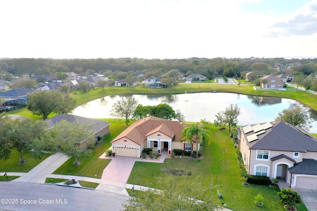 aerial view with a residential view and a water view