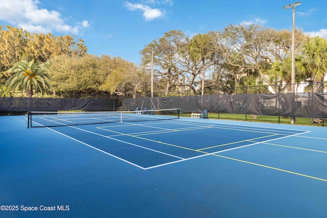 view of sport court featuring community basketball court and fence