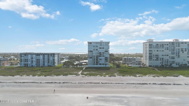 750 N Atlantic Ave Ph 4, Cocoa Beach, FL 32931 - view of building exterior featuring view of water and beach
