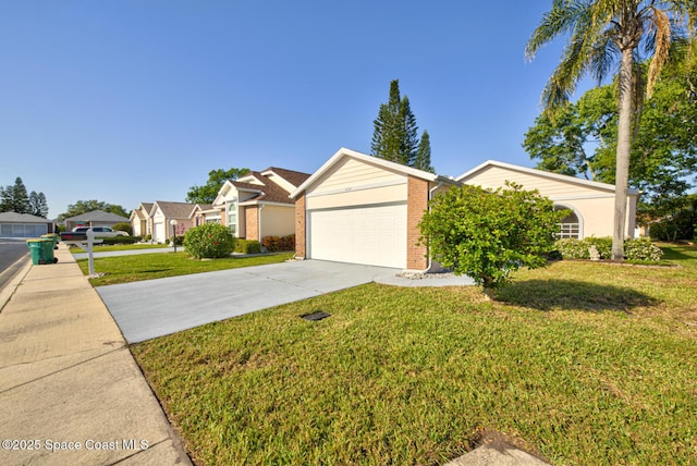 single story home with a front yard, driveway, a residential view, a garage, and brick siding