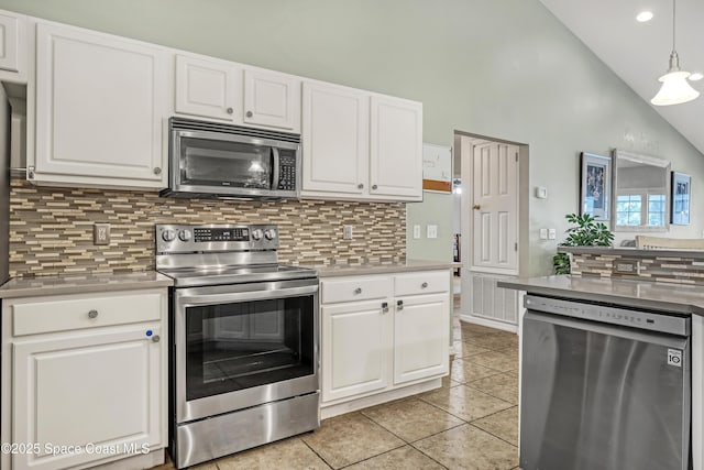 kitchen featuring white cabinets, appliances with stainless steel finishes, and light countertops