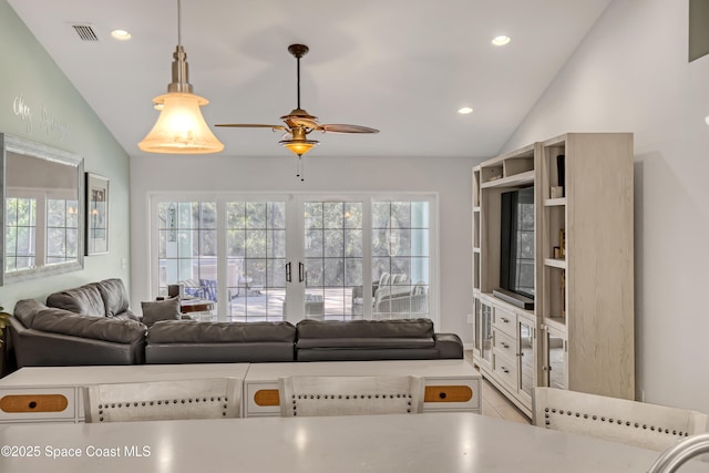 tiled living room featuring recessed lighting, visible vents, lofted ceiling, and ceiling fan