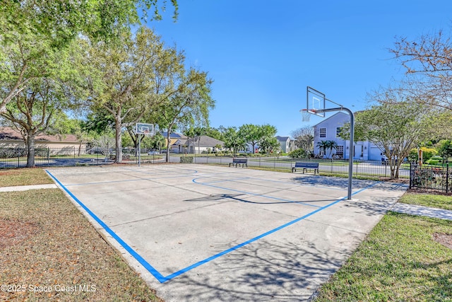 view of basketball court featuring community basketball court and fence