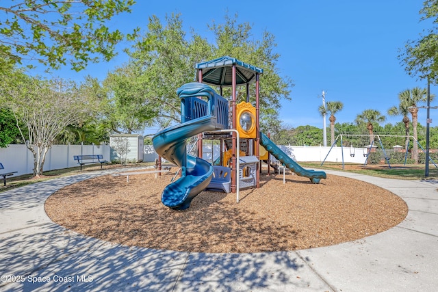 community jungle gym with fence