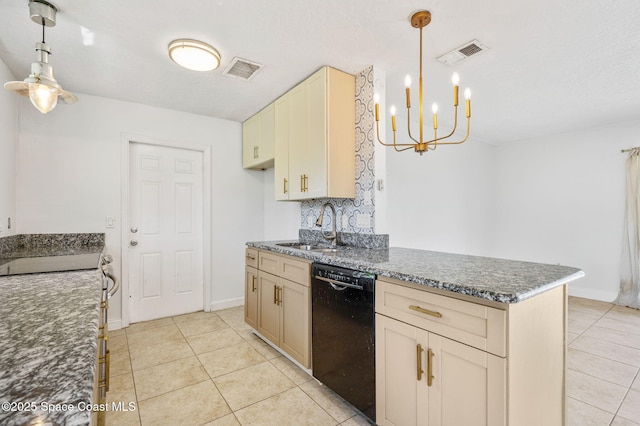 kitchen with a sink, visible vents, dishwasher, and an inviting chandelier