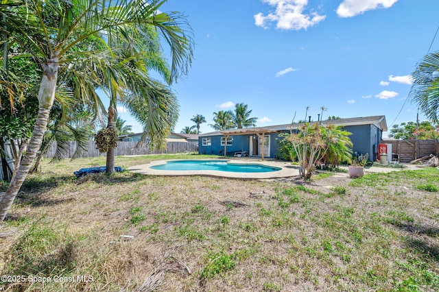 view of pool featuring a fenced in pool, a fenced backyard, and a patio area