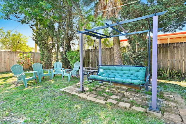 view of yard with a fenced backyard