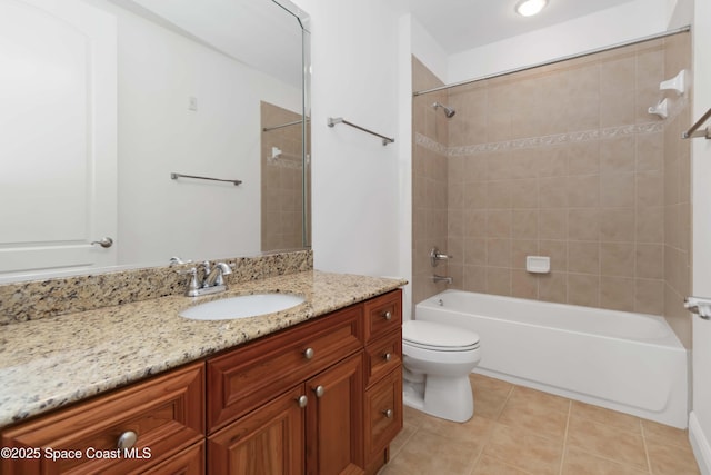 full bathroom featuring tile patterned flooring, toilet, vanity, and  shower combination